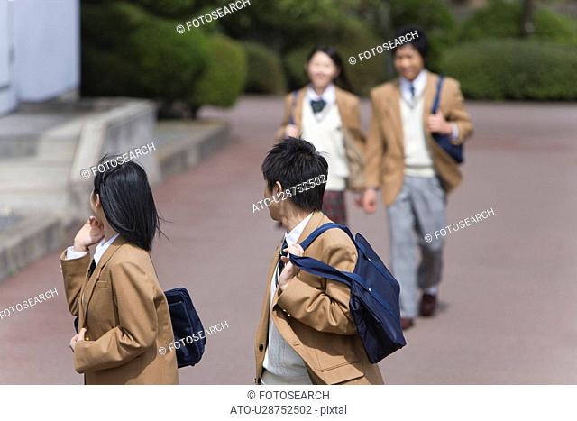 High School Students Walking Outside Together, Selective Focus