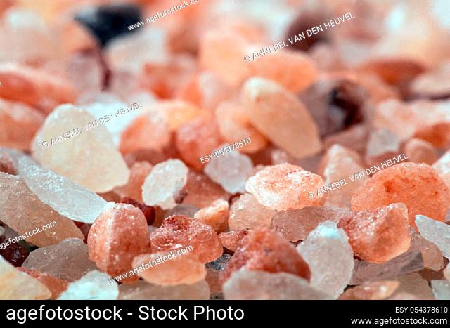 Himalayan Pink rock Salt Background, selective focus close-up, food concept