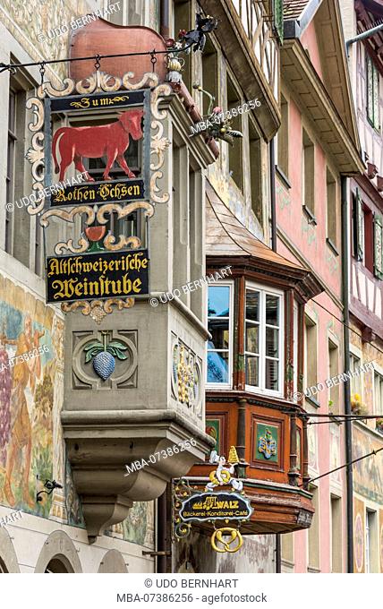 Colorful half-timbered houses and wine tavern to the 'red ox' at the town hall square, Stein am Rhein, canton Schaffhausen, Switzerland