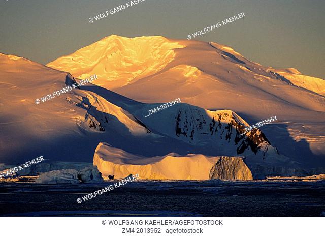 ANTARCTIC PENINSULA AREA, MOUNTAINS & PACK ICE, IN MIDNIGHT SUNLIGHT