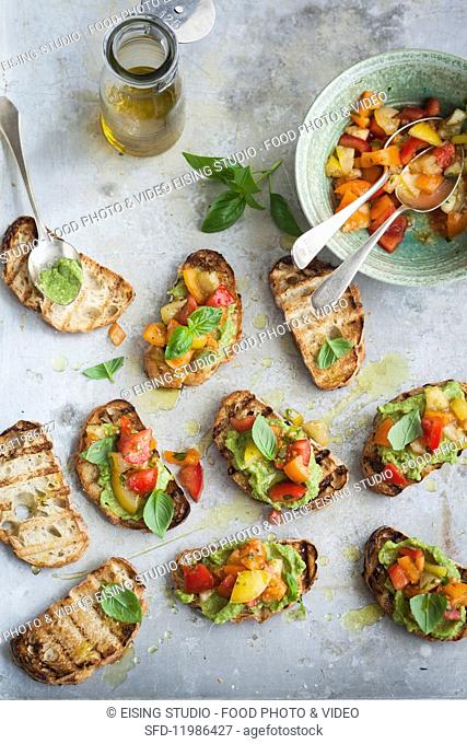 Bruschetta with avocado and colourful tomatoes