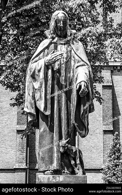 Statue of a saint with a lamb in front of the St. Joris church in Eindhoven, The Netherlands, Europe