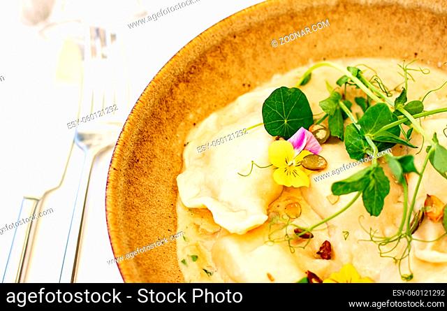 Traditional cuisine, culinary and gourmet travel, homemade dumplings in mushroom sauce recipe, polish pierogi in luxury restaurant in Old Town