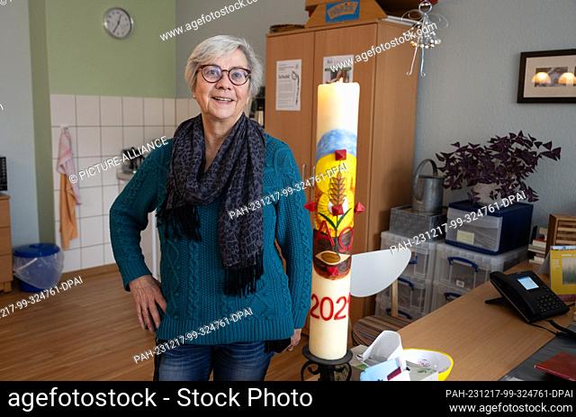 PRODUCTION - 28 November 2023, Hesse, Butzbach: Prison chaplain Barbara Zöller stands in her office in Butzbach Prison. The pastor is co-organizer of a...