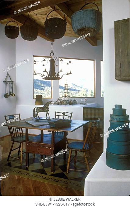 EATING AREAS: Rustic eating area with wicker baskets hanging from exposed beams. Hobby horse, blue taupe color scheme, modern space, painted floor cloth