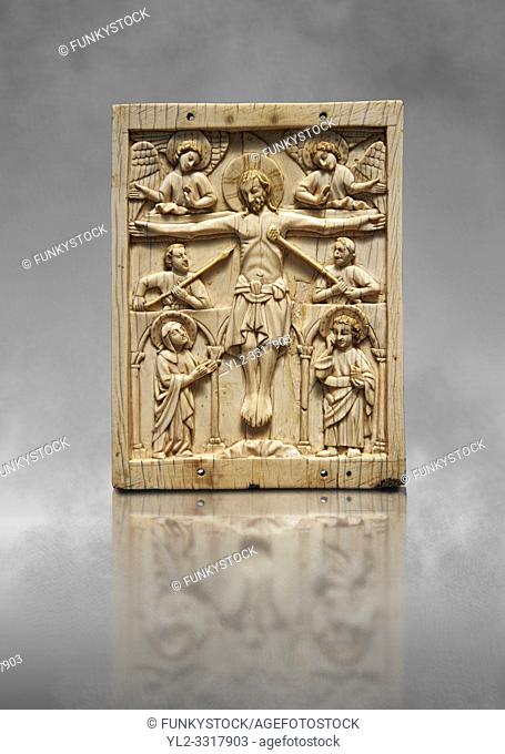 Medieval elephant ivory plaque with traces of paint made in Italy in the 13th or start of the 14th century. The crucifixion is a rare example of a Gothic piece...