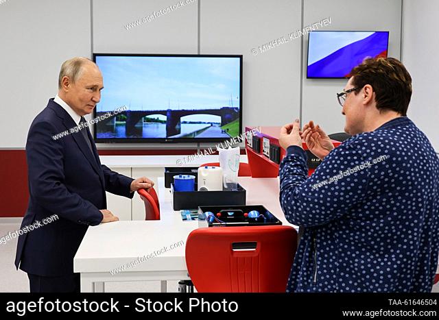 RUSSIA, TVER REGION - SEPTEMBER 1, 2023: Russia's President Vladimir Putin (L) is seen during a tour of new buildings of a kindergarten and a secondary...