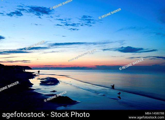 Baltic Sea beach with surf at blue hour in summer