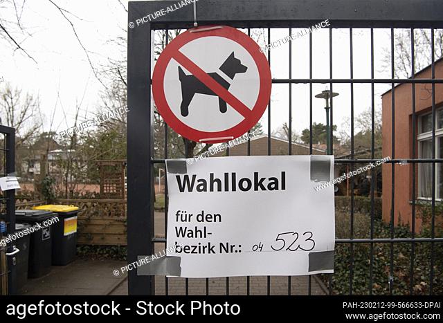 12 February 2023, Berlin: ""Polling station"" is written on the note on a fence in Schmargendorf. The election for the 19th Berlin House of Representatives on...