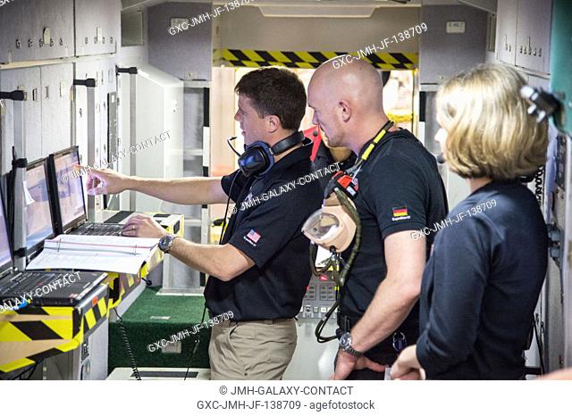 Expedition 4041 Flight Engineers Reid Wiseman (left) of NASA and Alexander Gerst of the European Space Agency are pictured in a training mockup of the Zvezda...