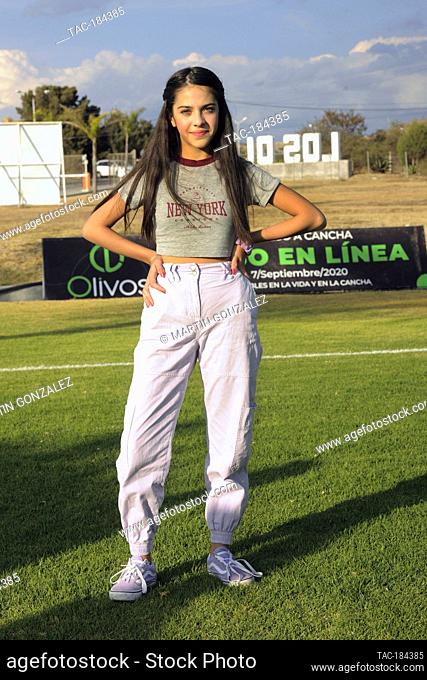 PUEBLA, MEXICO – DECEMBER 19: Actress Cassandra Iturralde poses for photos during the press conference ‘Emma en Los Olivos’ at  Los Olivos Football Club on...