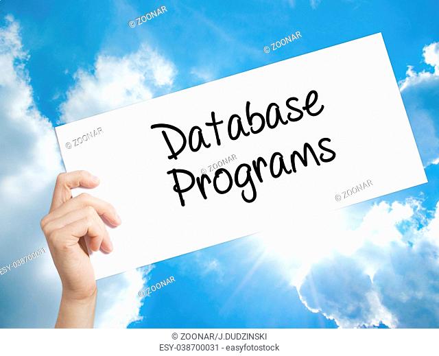 Database Programs Sign on white paper. Man Hand Holding Paper with text. Isolated on sky background