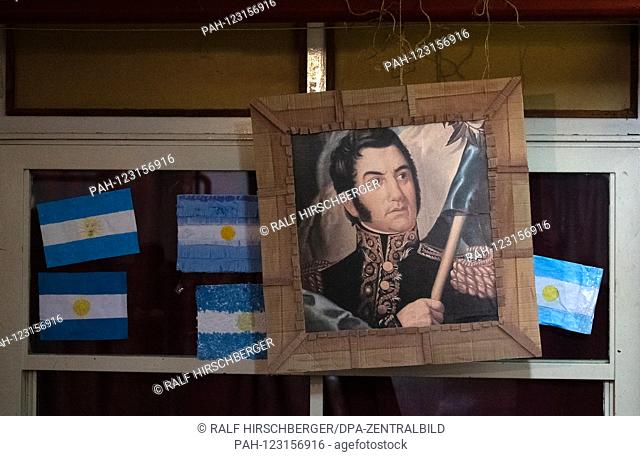 A portrait of the South American independence advocate JosÃ © de San MartÃn hung during the poll at the primaries for the presidential election in a polling...