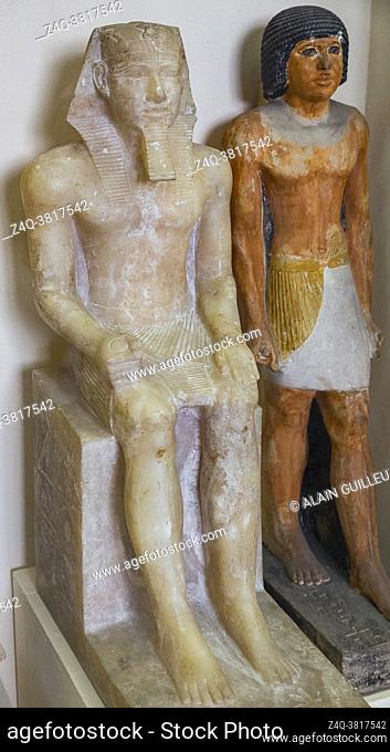 Cairo, Egyptian Museum, statue of king Khephren, egyptian alabaster, from Memphis. He's seated, wears a nemes with an uraeus