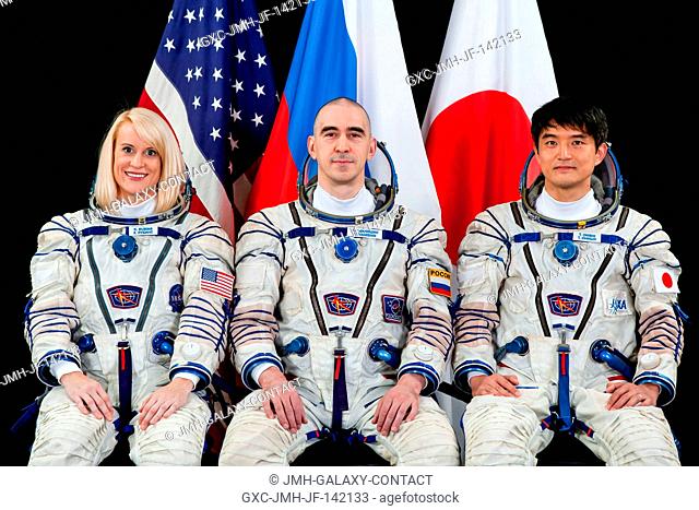 Portrait of Expedition 4849 crew members astronaut Kate Rubins, cosmonaut Anatoly Ivanishin (Expedition 49 Commander) and Japan Aerospace Exploration Agency...