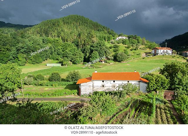 Rural view included a farmhouse, in Urrestilla, Basque Country