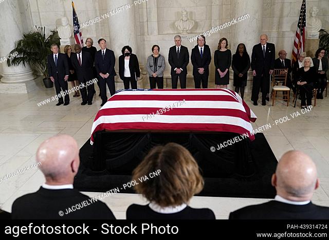 With family members in the foreground, in the back from left, Chief Justice of the United States John Roberts, Associate Justices of the Supreme Court Clarence...
