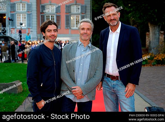 30 August 2023, North Rhine-Westphalia, Cologne: Florian Wünsche (l-r), actor, Hannes Jaenicke, actor, and Marcus Ammon, producer
