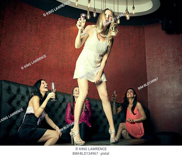 Women celebrating in nightclub