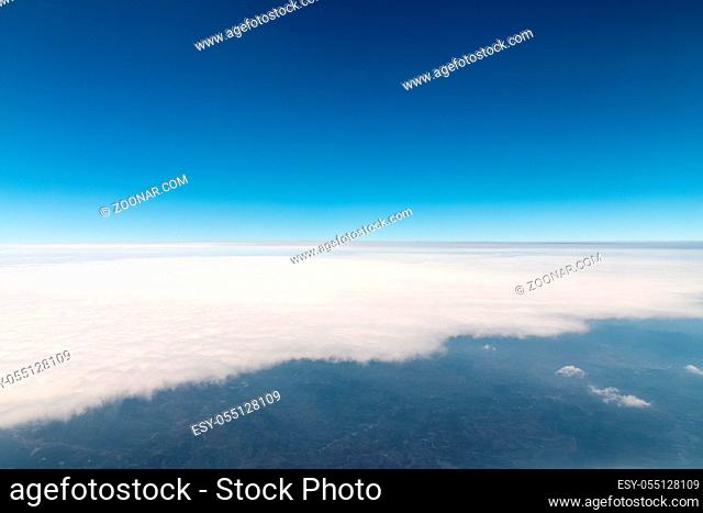 white cloud scene, outside the window of airplane