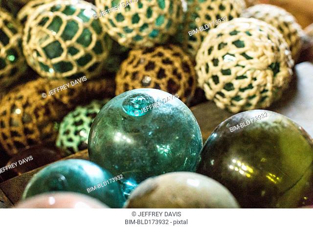 Close up of glass ball decorations with fishing net