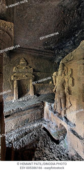 Inside view showing garbha griha with dwarpal of cave number nineteen in Panhale Kazi caves ; Konkan ; Maharashtra ; India
