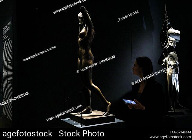 RUSSIA, MOSCOW - FEBRUARY 2, 2023: A visitor views sculptures at a press preview of the House of Culture of the USSR exhibition marking the centenary of the...