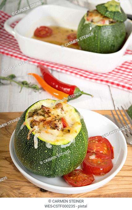 Filled Eight ball squashes with ground beef on plate, Low Carb