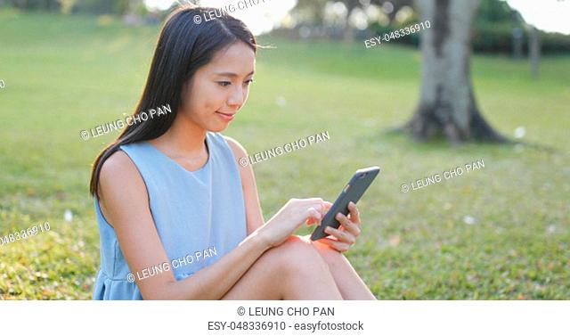 Woman looking at mobile phone