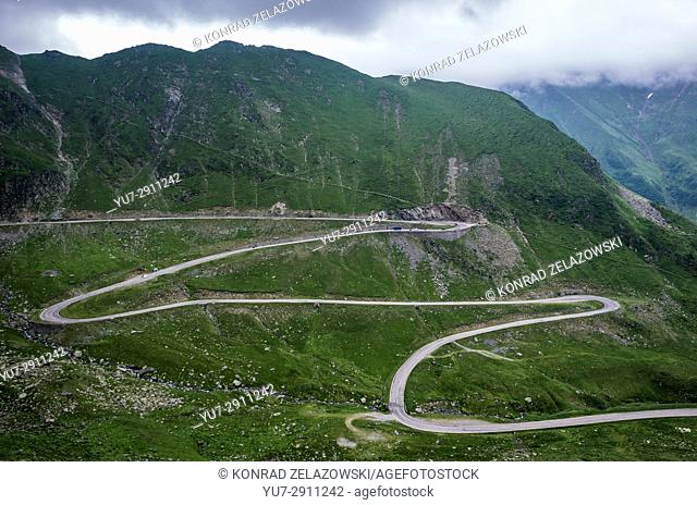 Scenic view with Transfagarasan Road (DN7C, also known as CeauÈ. escu's Folly) crossing the southern section of the Carpathian Mountains in Romania