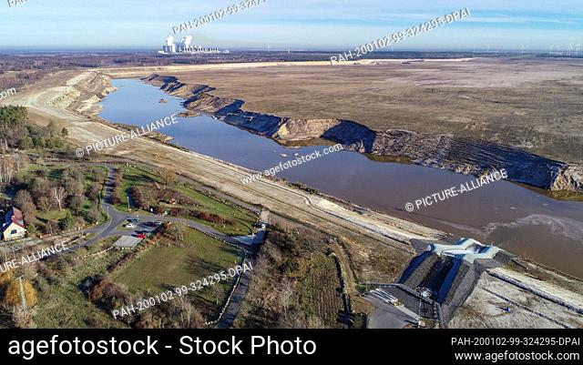02 January 2020, Brandenburg, Cottbus: View over the former opencast lignite mine Cottbus-Nord and future Cottbus Baltic Sea (aerial view with a drone)