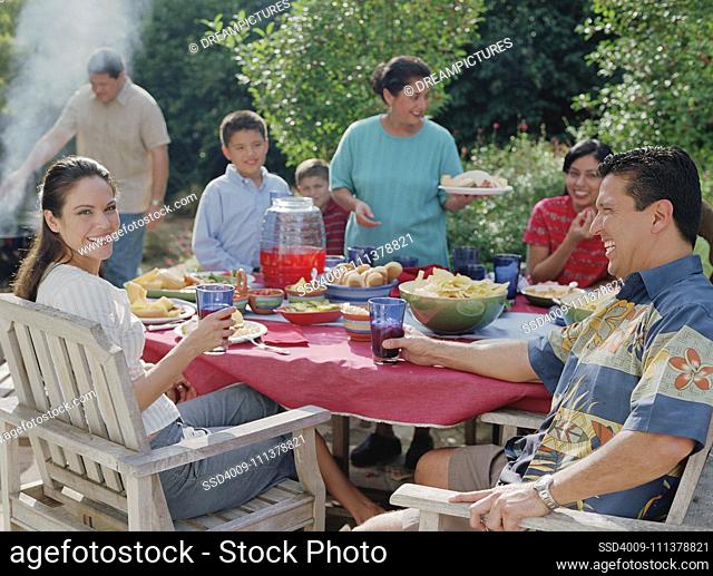 Family eating at a barbecue