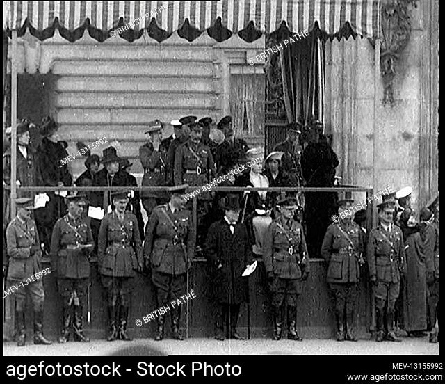 British Minister Of Munitions Winston Churchill Standing In Front Of King George V and Queen Mary On Stage As They Watch A Victory Parade In London - London