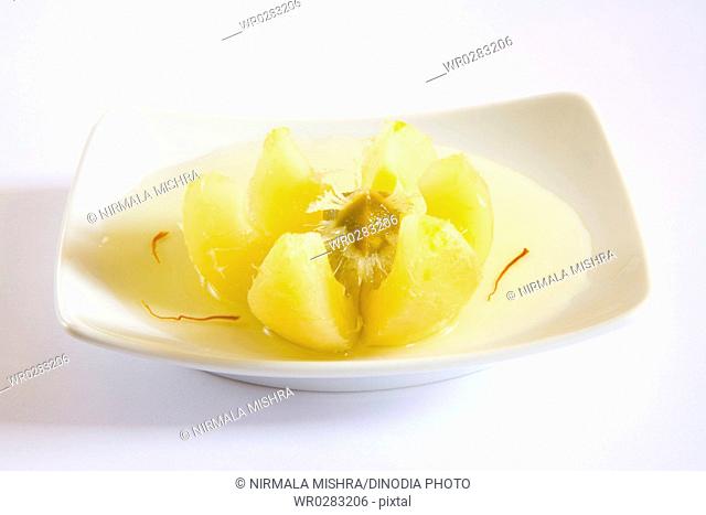 Fruits , gooseberry emblica sweet pickles kesar amla murabba emblica officinalis deep fry in sugar with saffron