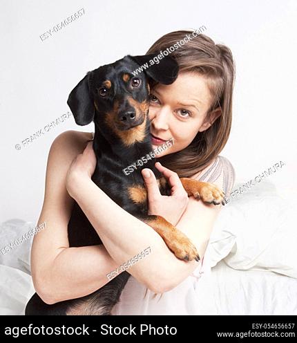 Portrait of a Woman with Brown Hair and her Dog