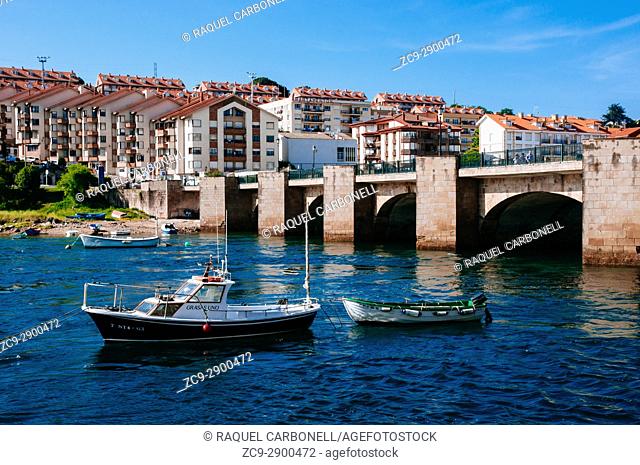 Houses bridge and boats on the sea, San Vicente de la Barquera, Cantabria, Spain