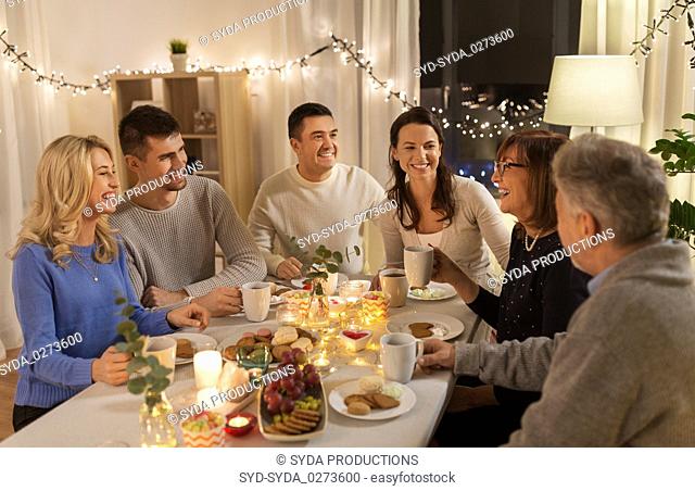 happy family having tea party at home