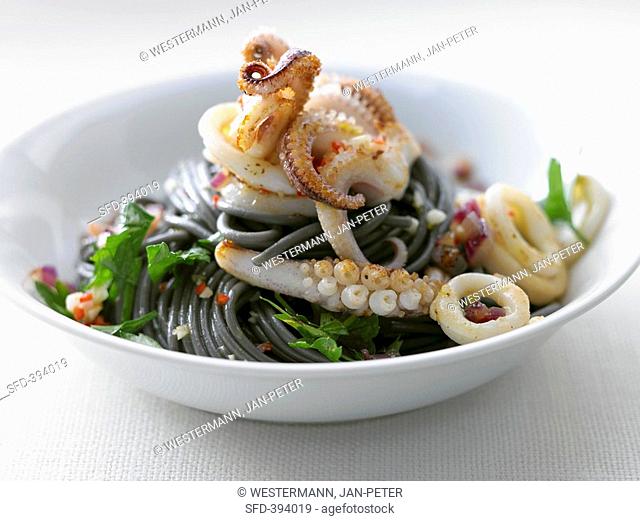 Spaghetti neri ai calamari Black spaghetti with squid