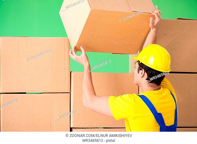 Man contractor working with boxes delivery
