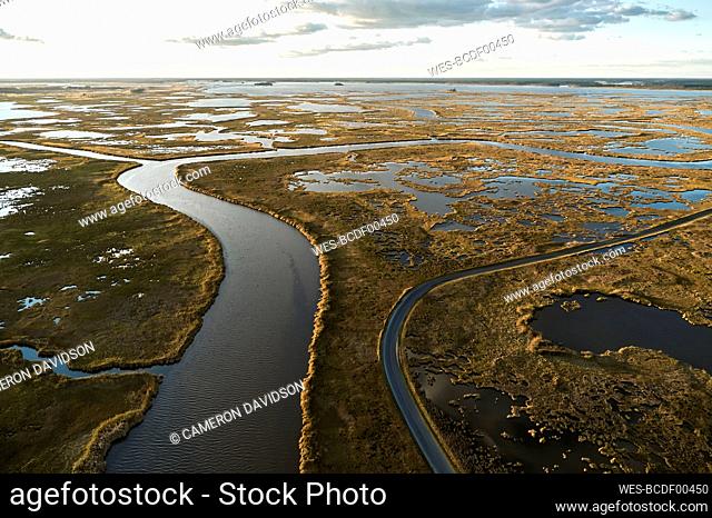 USA, Maryland, Drone view of marshes along Blackwater River at dusk