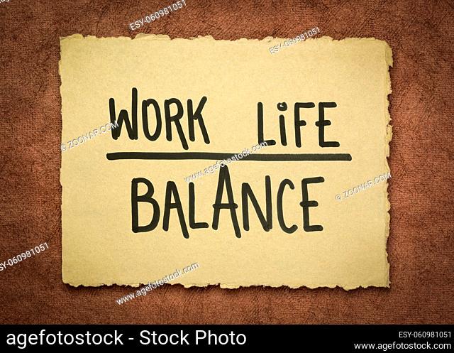 work and life balance - writing on a handmade textured paper, personal development, priorities, career and lifestyle concept