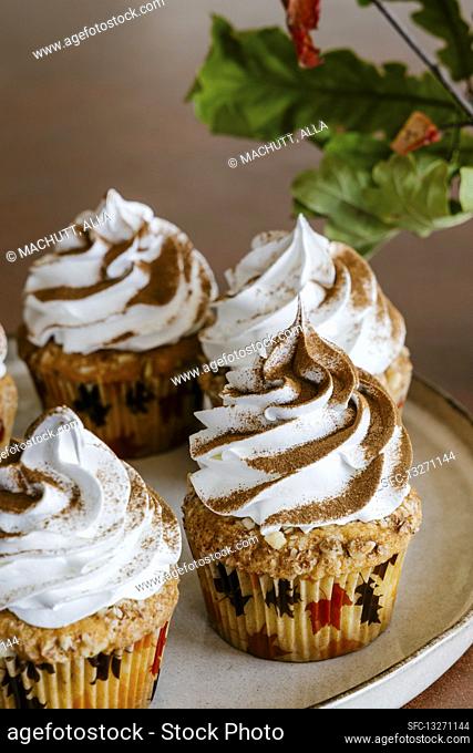 Cinnamon almond cupcakes with swiss meringue cream frosting