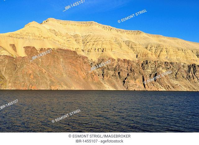 Mountain and sedimentary rocks at Cuming Inlet, Devon Island, Northwest Passage, Nunavut, Canada, Arctic