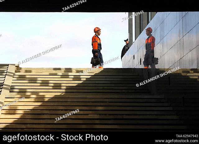 RUSSIA, MOSCOW - OCTOBER 3, 2023: Men work at Novatorskaya station of the Moscow Metro, currently under construction, with the first stage of the Troitskaya...