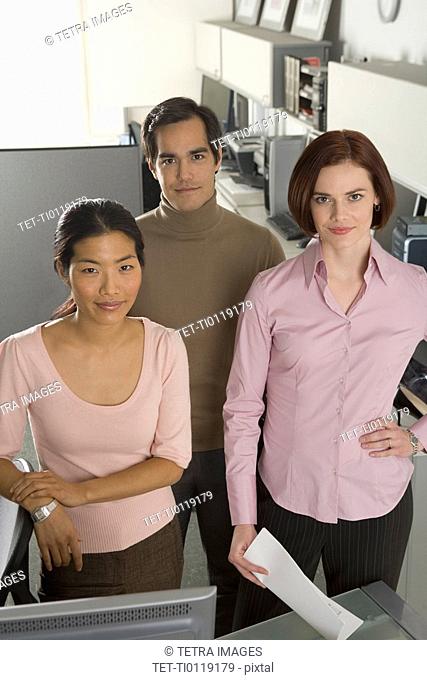 Portrait of three office workers