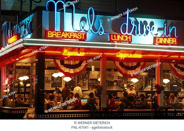 People taking dinner in restaurant, Mels Drive-In, Lombard Street, San Francisco, California, USA
