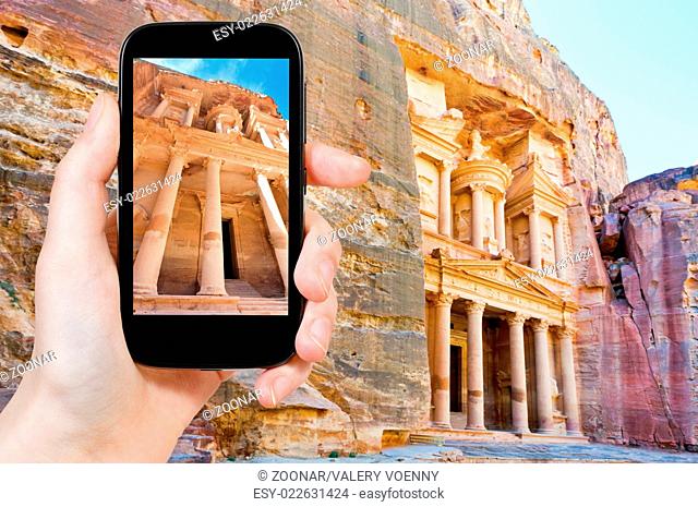 taking photo of Treasury temple in rock of Petra