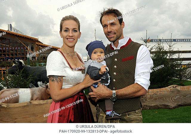 The former ski jumper Sven Hannawald, his wife Melissa and their sun Len seen during the 'AlpenHerz' (lit. Alpine heart - traditional costume manufacturer)...