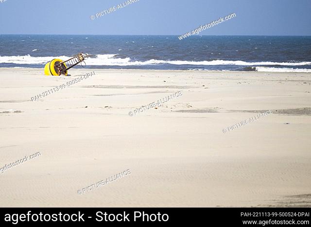 13 November 2022, Egypt, Metoobas: A buoy lies on a Mediterranean beach in the Nile Delta, which is a military protected area