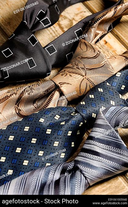 a variety of neckties knotted closeup